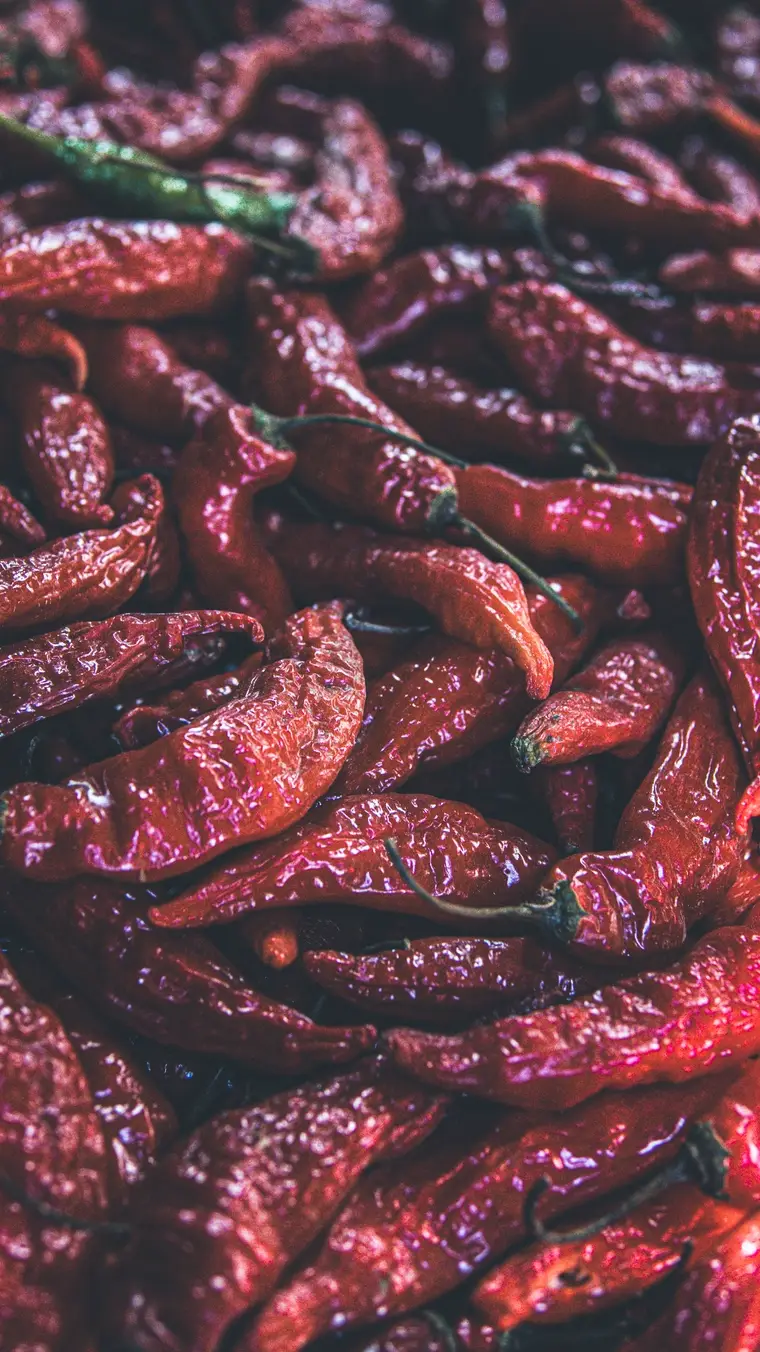 Dried red chillies heaped together