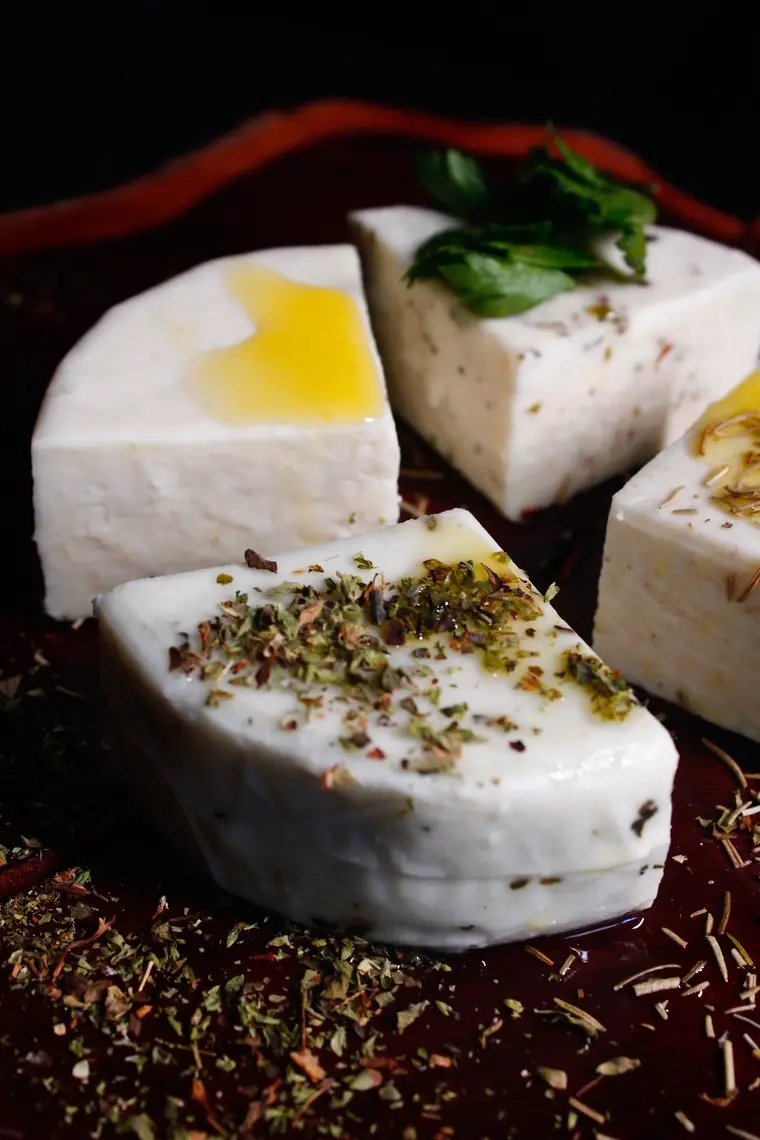A block of white brined cheese dusted with za’atar