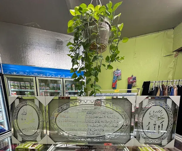 A display case of engraved calligraphy plaques in the shop