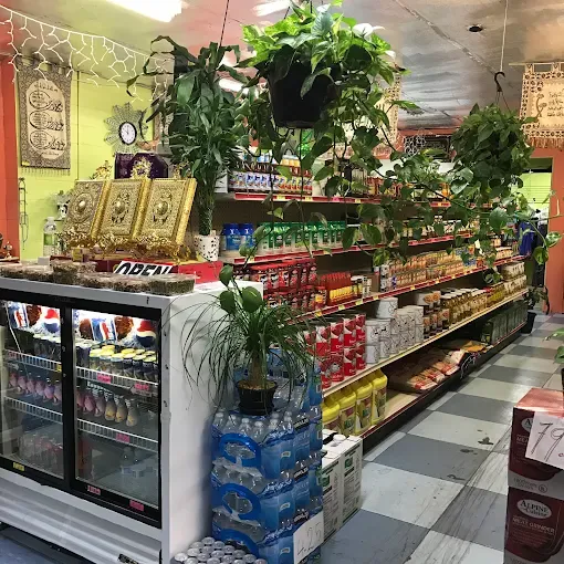 Stocked shelves and chiller cabinets inside the shop